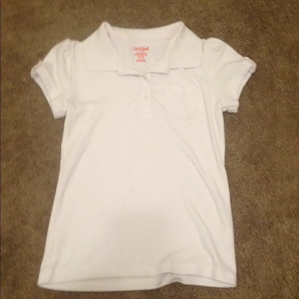 White partial button down shirt.